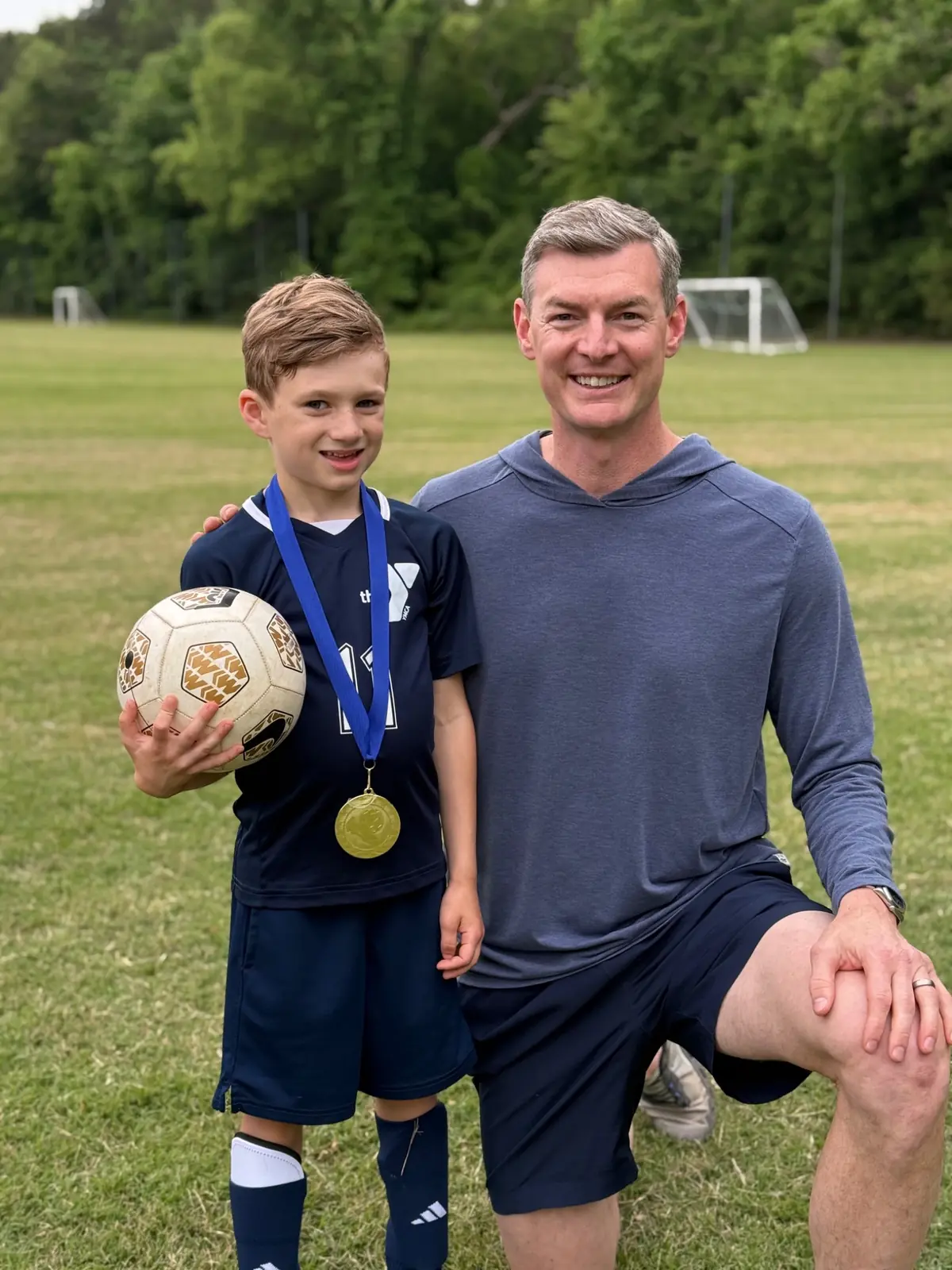 Leo with a gold soccer medal